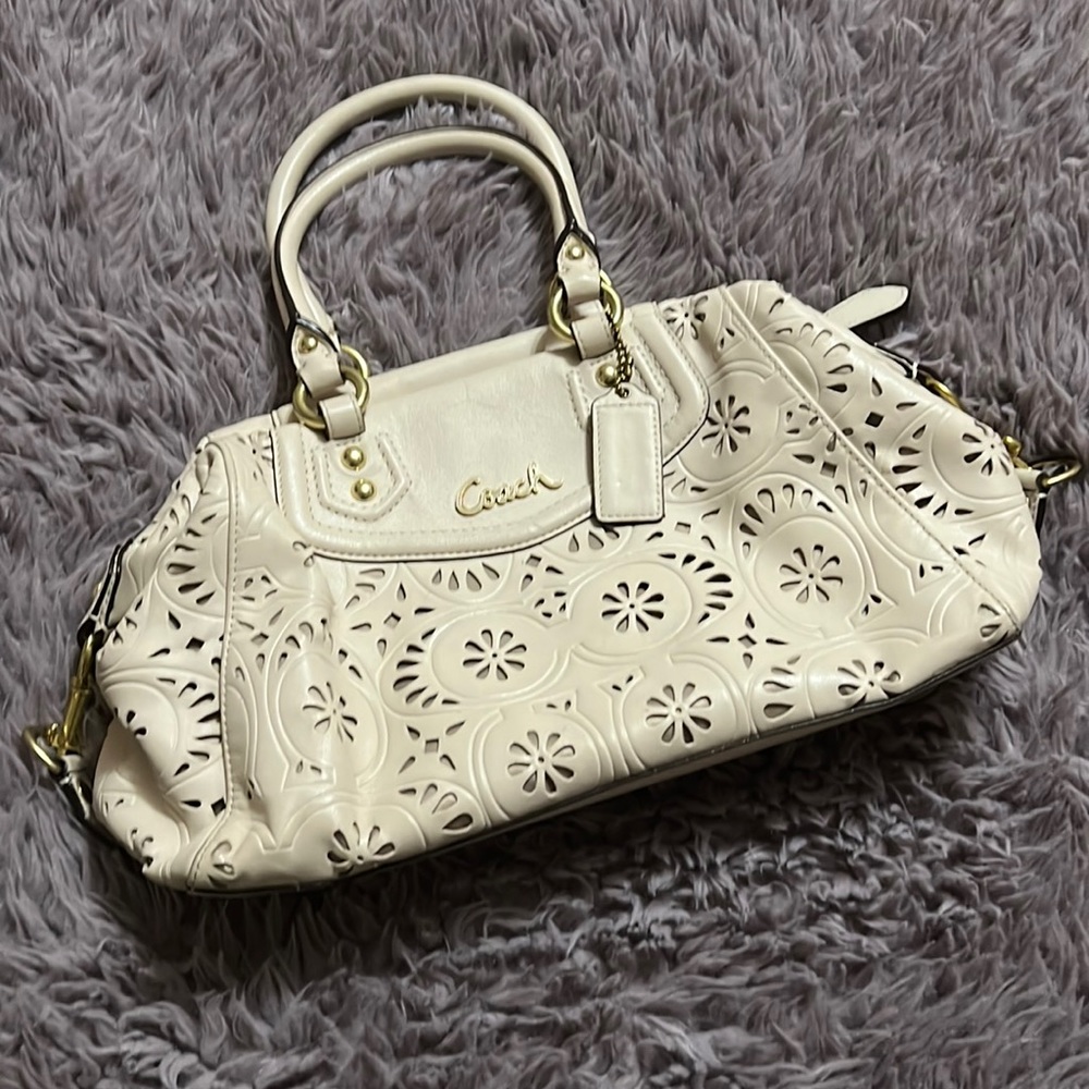 EUC ivory punch out Coach purse